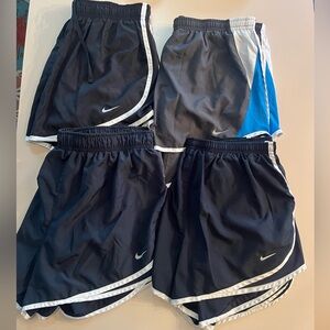 NIKE womens shorts set of 4 - 3 large and 1 XL